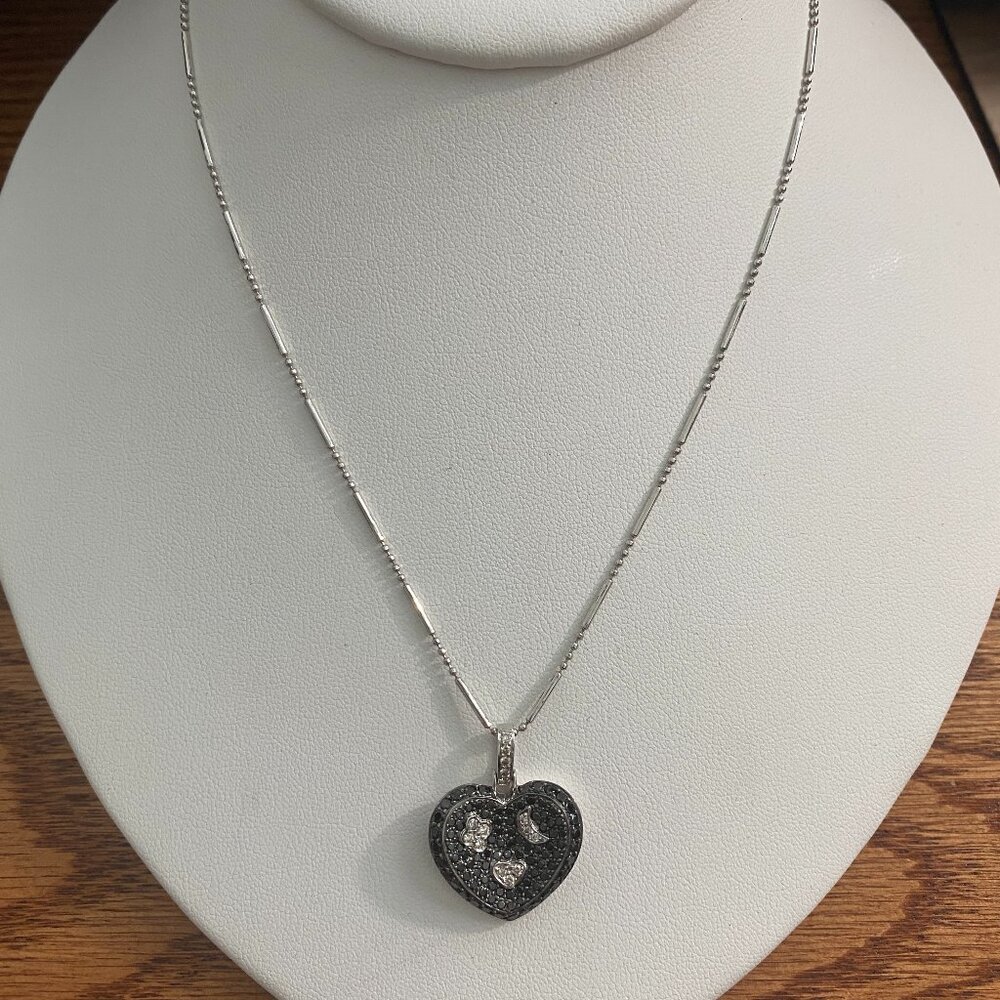 Black and white diamond heart necklace.  14K WG